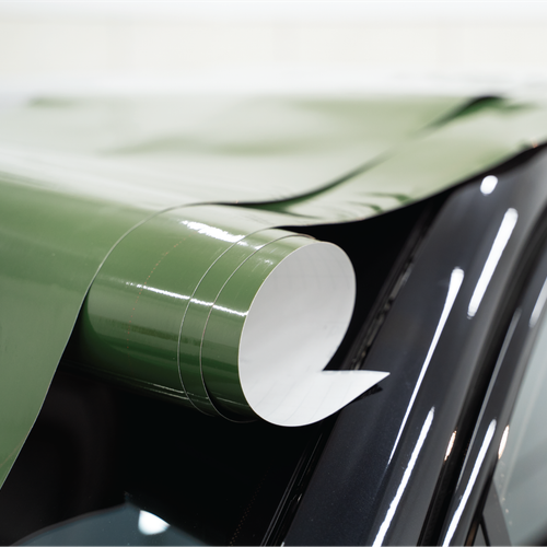 Closeup of a color change vinyl roll waiting to be installed on a truck
